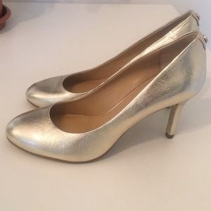 Gently used Michael Kors gold heel size 5.5
